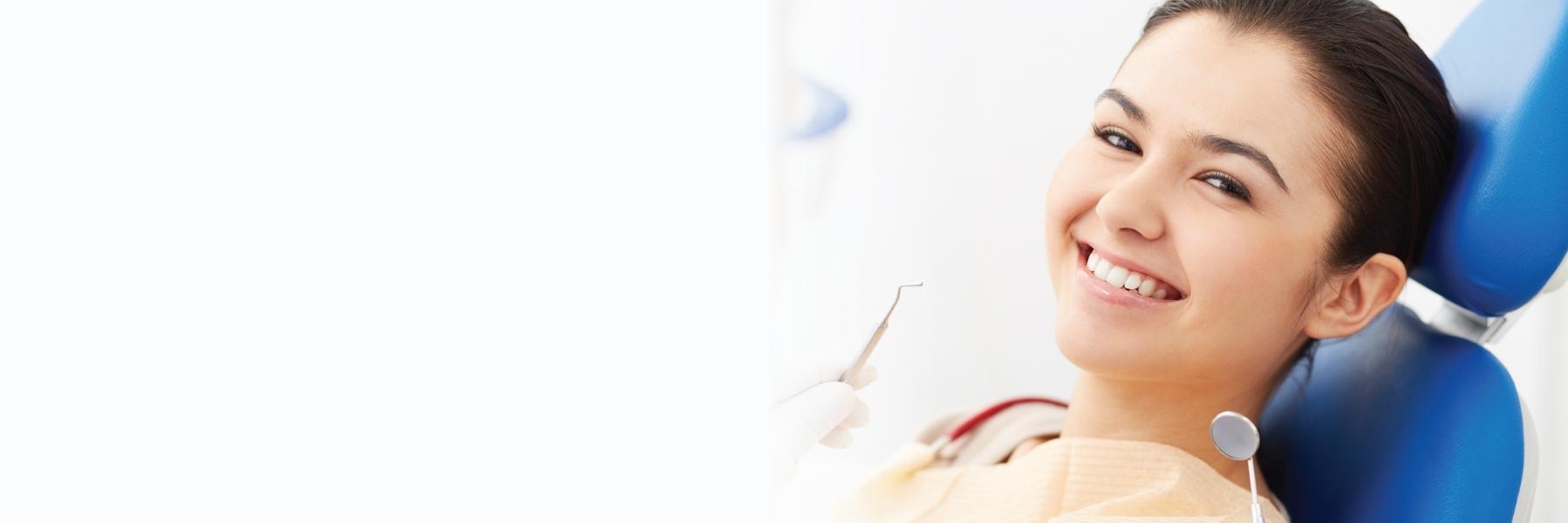 Patient smiling after emergency dental care in Bangor ME